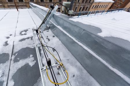 Cable tray outside with telecommunications cables, ground cables, optic fiber, power cables and...