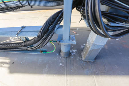 Russia, Saint-Petersburg - March 29, 2019: Cables of Base Transceiver Station (BTS) are installed on top of a building. Outside part 5G, 4G, 3G, 2G basic station.のeditorial素材