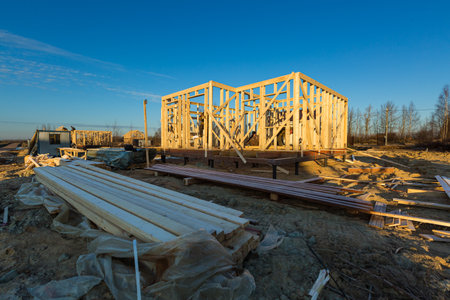 New residential construction of wooden frame house. Roofing construction. Wooden construction....