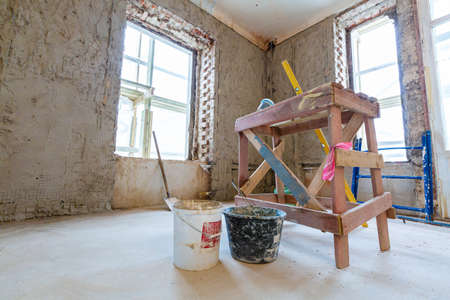 Working process of renovate room from wooden platform in apartment is under construction, remodeling, renovation, extension, restoration and reconstruction.の写真素材