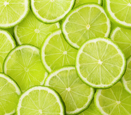 Green background with citrus-fruit of lime slices

の写真素材