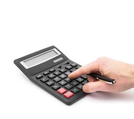 Calculator with hand on whiteの写真素材