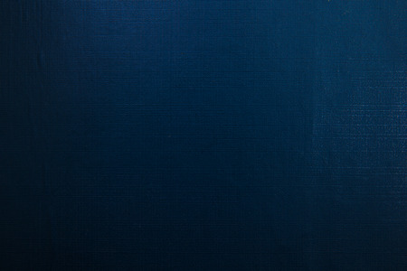 Grain blue paint wall background or textureの写真素材