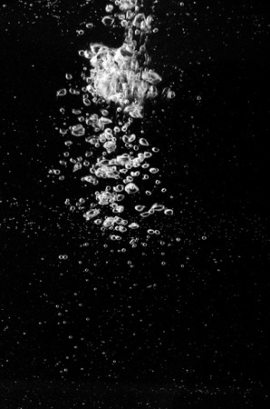 water splash on black backgroundの写真素材