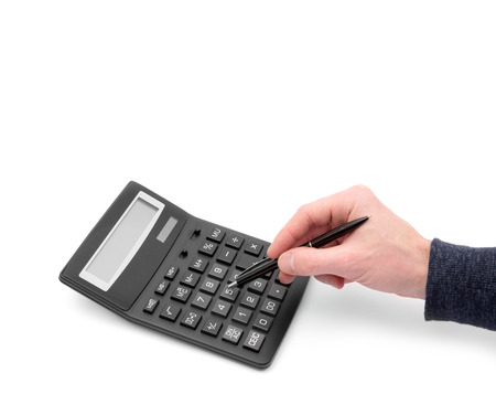 Calculator with hand on whiteの写真素材