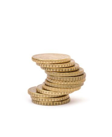 golden coins isolated on white backgroundの写真素材