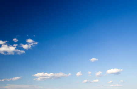 blue sky background with tiny cloudsの写真素材