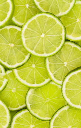 Green background with citrus-fruit of lime slices

の写真素材