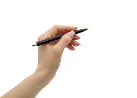 Close up of women arm writing with metallic penの写真素材