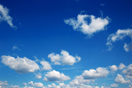 blue sky background with tiny cloudsの写真素材