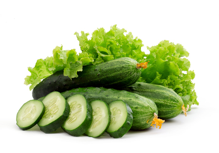 Cucumber and slices isolated on a white backgroundの写真素材