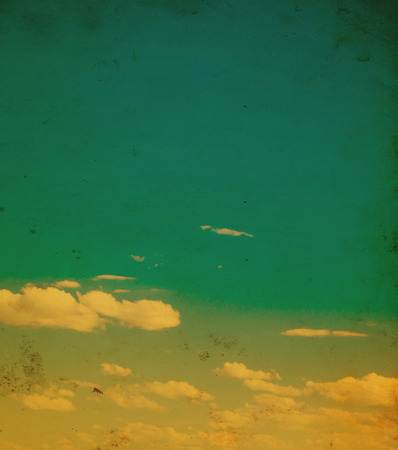 Blue sky background with tiny cloudsの写真素材