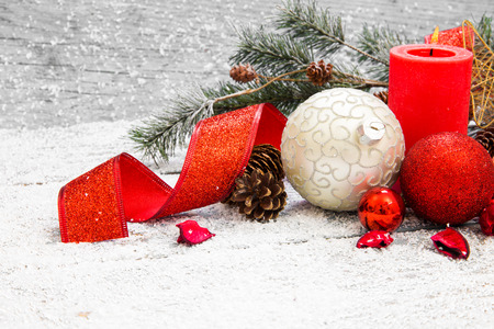 Christmas decoration hanging over wooden backgroundの写真素材