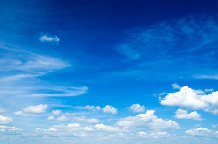 blue sky background with tiny cloudsの写真素材