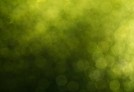 Christmas background. Festive abstract background with bokeh defocused lightsの写真素材