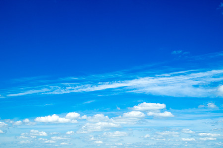 blue sky background with tiny cloudsの写真素材