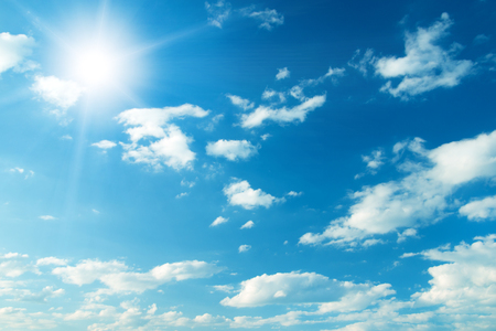 Blue sky with clouds and sun. Blue sky with clouds and sun.