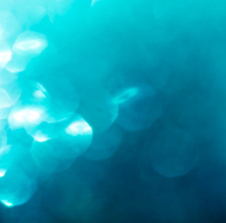 glittering stars on bokeh backgroundの写真素材