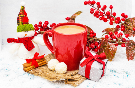 Christmas holiday background with coffee cupの写真素材