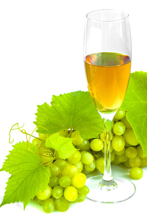 Glasses of wine and grapes isolated on whiteの写真素材