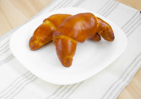 Tasty bagels on wooden backgroundの写真素材