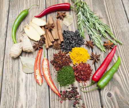 Mix of spices on the wooden backgroundの写真素材
