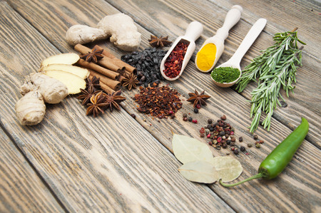 Mix of spices on the wooden backgroundの写真素材
