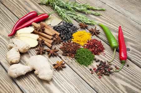 Mix of spices on the wooden backgroundの写真素材