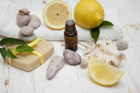 Lemon handmade soap with essential oils and lemon on a white backgroundの写真素材