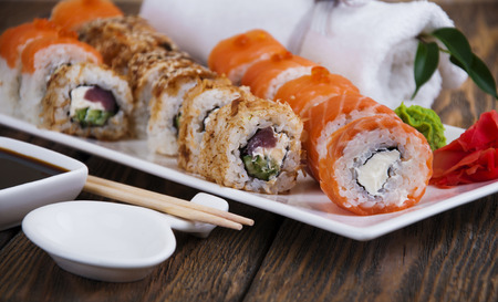 Sushi rolls,wasabi and ginger on a plateの写真素材