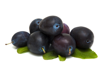 Ripe plums isolated on white backgroundの写真素材