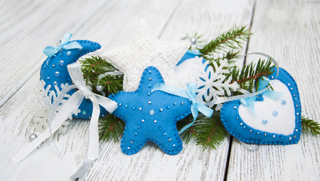 Homemade Christmas decorations over wooden backgroundの写真素材