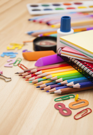 School office supplies on a wooden tableの写真素材