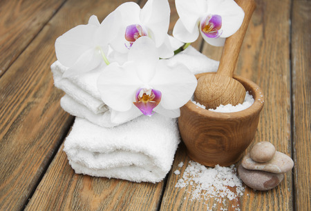 Spa composition with orchids on wooden backgroundの写真素材