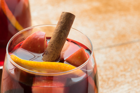 Homemade delicious red sangria with oranges and applesの写真素材