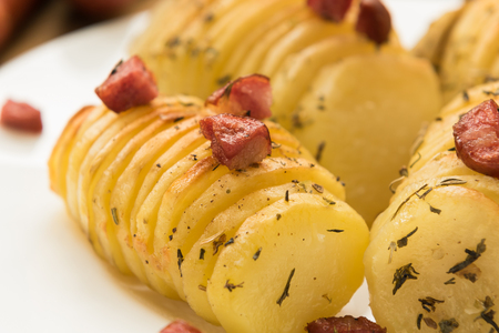 Homemade crispy potato roast with hunting sausagesの写真素材