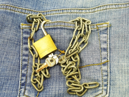 Jeans packet and padlock     の写真素材