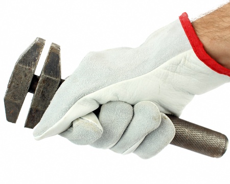 Adjustable spanner in hand with protection glove