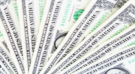 Dollars and dice on white background  