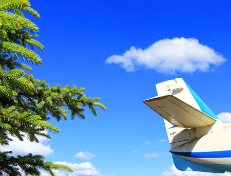 The tail of the aircraft on blue skyの写真素材