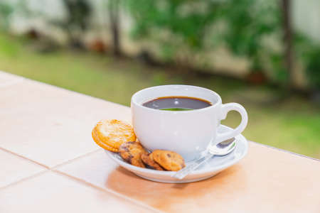 Morning Americano coffee in the front gardenの写真素材
