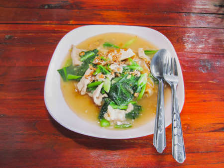fried noodle, marinated pork with kale in gravy, delicious lunchの写真素材
