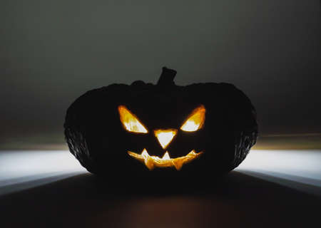 On Halloween, people like to carve a pumpkin into a devil and put candles, called Jack O'Lantern.の写真素材