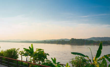 The atmosphere along the Mekong River in the evening that separates Thailand and Laos.の写真素材