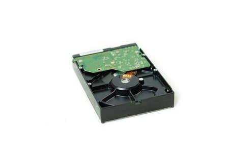 Close-up of the back of a 3.5-inch mechanical hard drive on isolate white background.の写真素材