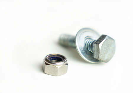 Steel Nut, Bolt, and Washer on isolate white background.の写真素材