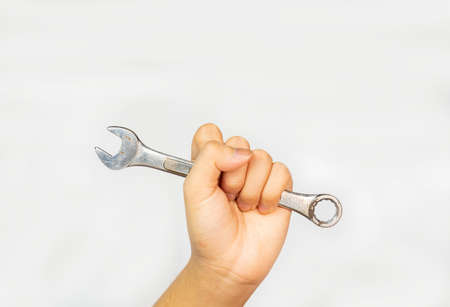 Workers hand and wrench concept all service on isolate white background.の写真素材