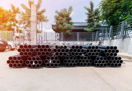 Galvanized steel pipe stack on floor waiting for install roof structure.の写真素材