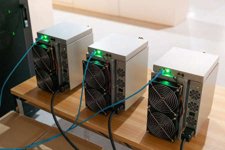 Cryptocurrency mining machine working in server room.A new investment in present day.の写真素材