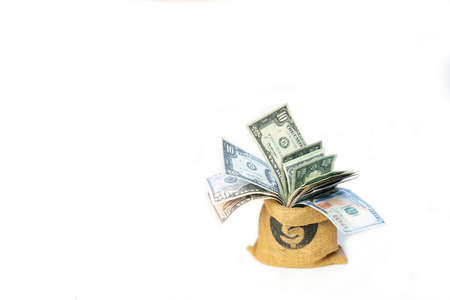 Sack full of dollar bill a saving concept on isolate white background. Saving money concept.の写真素材